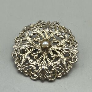 Elegant Gold and Silver Filigree Brooch